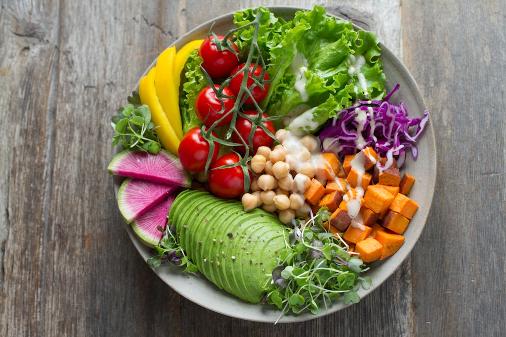 Bowl of fresh organic vegetables and healthy foods
